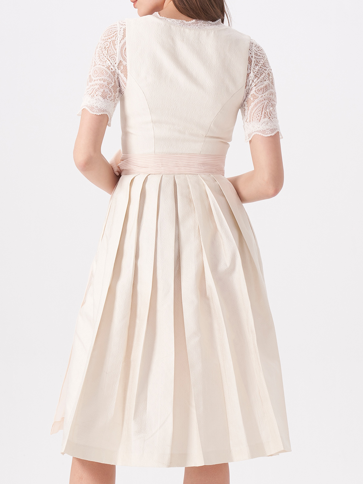 Dirndl mit tiefer Ausschnitt in Beige
